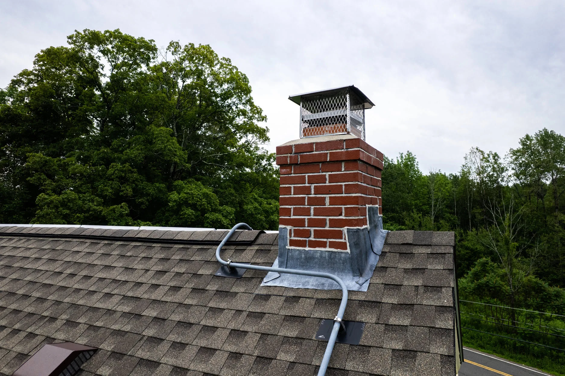 Chimney Flashing installation and repair by MBC Roofing Contractors